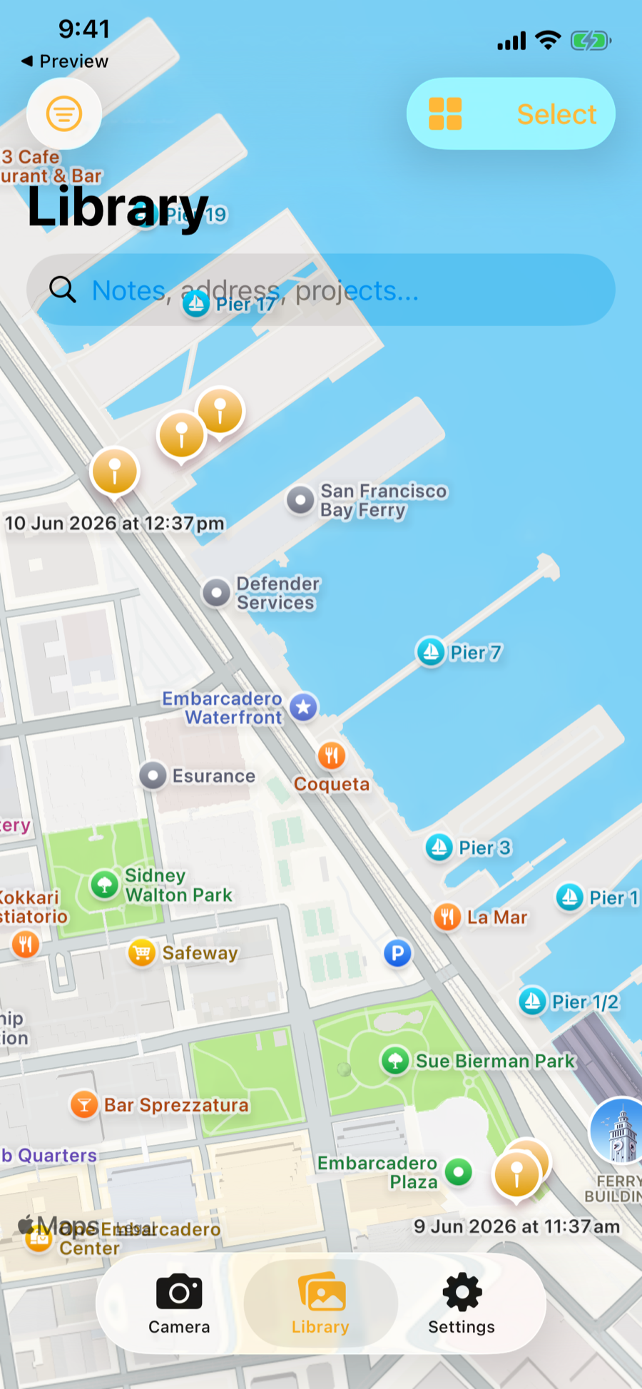 Map view showing Stampr photo pins along the waterfront