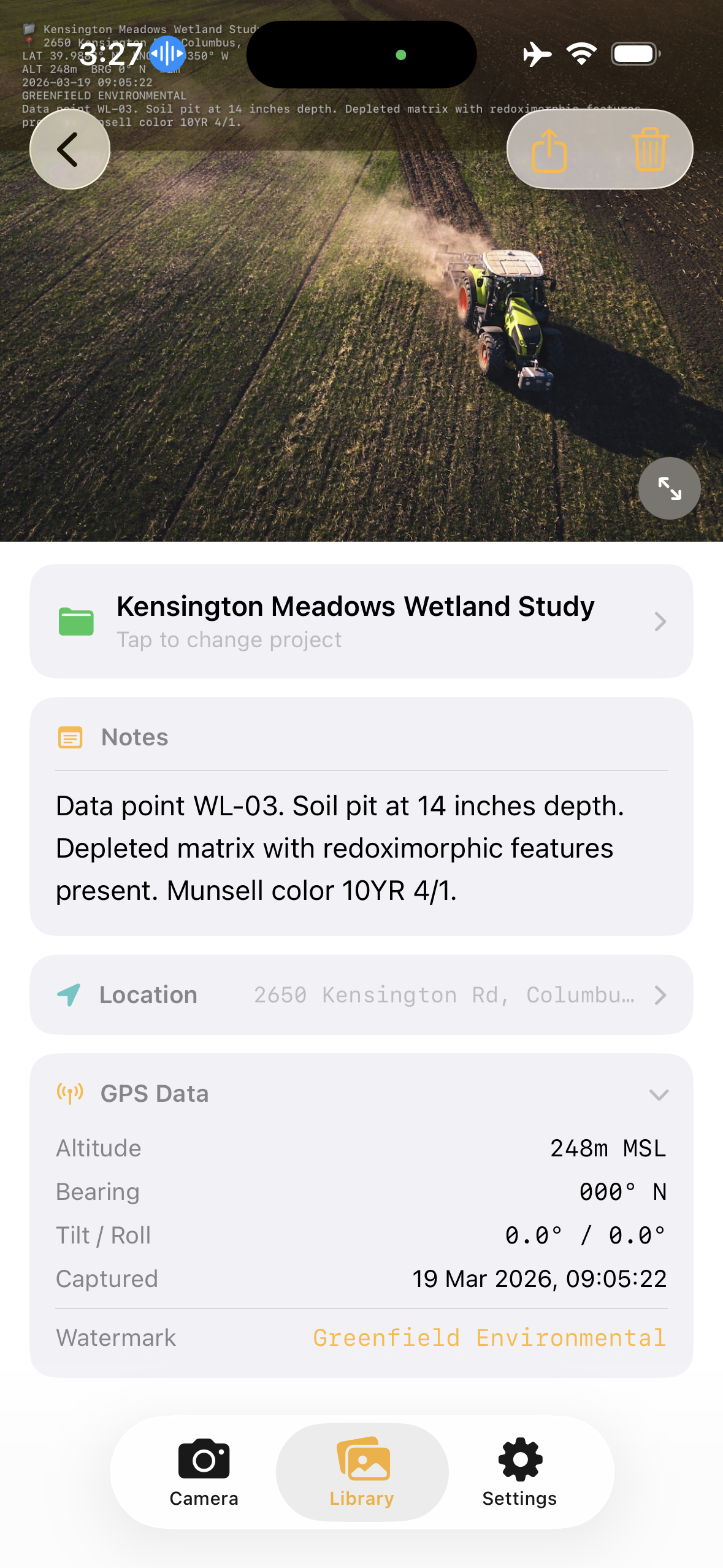 Photo detail with expanded GPS data showing altitude, bearing, tilt, and watermark