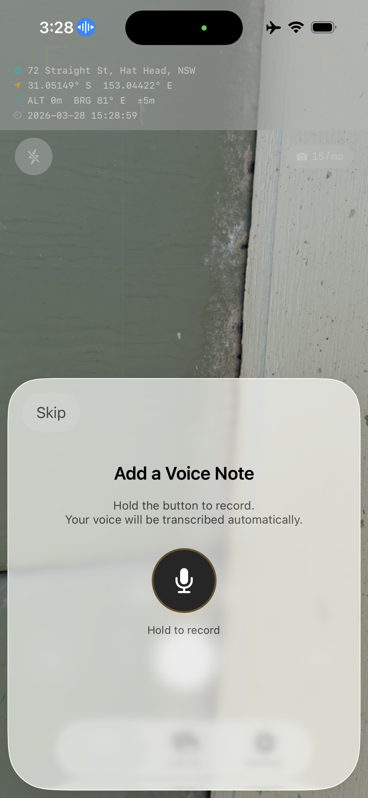 Voice note recording prompt showing hold-to-record microphone button